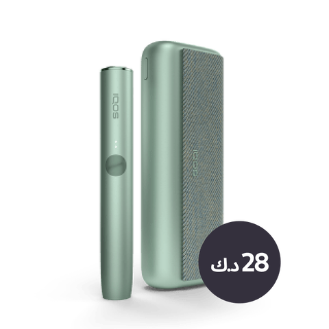 A jade green IQOS ILUMA PRIME device and holder.