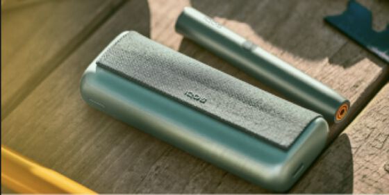 An IQOS ILUMA Pocket Charger and Holder.