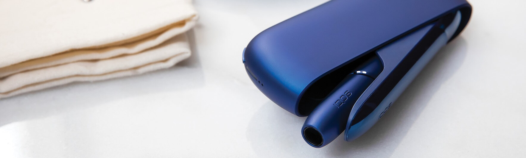 A dark blue IQOS